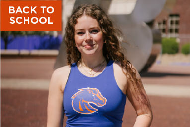 Mobile image 2 of 4, student in tank top in front of Bronco B at the Administration Building. Click here to shop back to school supplies!